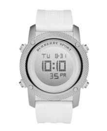 This Burberry watch features a white logo-stamped strap and round stainless steel case with knurled bezel. Positive display digital dial features day, date, time and seconds in black. Digital movement. Water resistant to 100 meters. Two-year limited warranty. This Burberry watch features a white logo-stamped strap and round stainless steel case with knurled bezel. Positive display digital dial features day, date, time and seconds in black. Digital movement. Water resistant to 100 meters. Two-year limited warranty.