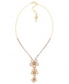 Petal perfection. Betsey Johnson's pretty three flower pendant features shimmering pink and purple crystals set in pave. Crafted in antique gold-plated mixed metal. Approximate length: 16 inches + 3-inch extender. Approximate drop: 2-1/2 inches.