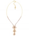 Petal perfection. Betsey Johnson's pretty three flower pendant features shimmering pink and purple crystals set in pave. Crafted in antique gold-plated mixed metal. Approximate length: 16 inches + 3-inch extender. Approximate drop: 2-1/2 inches.