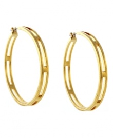 Architecturally sound. Vince Camuto takes a traditional hoop earring and adds subtle, structured details with a unique open-cut design. Set in gold tone mixed metal. Approximate diameter: 3-3/4 inches. Architecturally sound. Vince Camuto takes a traditional hoop earring and adds subtle, structured details with a unique open-cut design. Set in gold tone mixed metal. Approximate diameter: 3-3/4 inches.