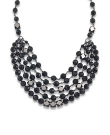 Make an elegant entrance with Carolee's beaded statement necklace. Layered with jet crystals, it's set in hematite tone mixed metal. Approximate length: 24 inches.