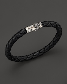 A sterling silver bamboo pushlock is a bold finish to this braided leather bracelet from the John Hardy Bamboo Collection. A sterling silver bamboo pushlock is a bold finish to this braided leather bracelet from the John Hardy Bamboo Collection.