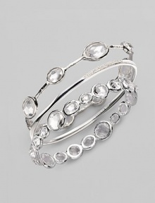From the Paparazzi Collection. Ovals of faceted clear quartz shimmer within a bangle of polished sterling silver. Clear quartz Sterling silver Diameter, about 2¾ Imported Please note: Bracelets sold separately. From the Paparazzi Collection. Ovals of faceted clear quartz shimmer within a bangle of polished sterling silver. Clear quartz Sterling silver Diameter, about 2¾ Imported Please note: Bracelets sold separately.