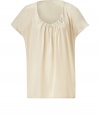 Stylish top in fine, pure pale beige silk - Super-soft, lightweight fabric drapes like a dream - Chic smocked style with short sleeves and round, gathered neckline - Gentle pleating throughout bodice - An elegant, versatile basic in a classic shade - Dress up with a cropped jacket, pencil skirt and peep toe pumps, or go for a more casual look with skinny denim and sandals