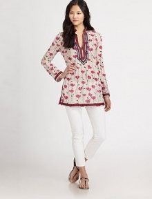 Fine-spun cotton, patterned with a delicate poppy print and trimmed in colorful ribbon.Band collarFront ventLong sleevesRibbon trimConcealed side zipAbout 29 from shoulder to hemCottonDry cleanImportedModel shown is 5'10 (177cm) wearing US size 4. Fine-spun cotton, patterned with a delicate poppy print and trimmed in colorful ribbon.Band collarFront ventLong sleevesRibbon trimConcealed side zipAbout 29 from shoulder to hemCottonDry cleanImportedModel shown is 5'10 (177cm) wearing US size 4.