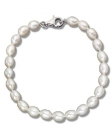 As necessary as a little black dress. This simple sterling silver bracelet features oblong cultured freshwater pearls (6-7 mm). Approximate length: 8 inches. As necessary as a little black dress. This simple sterling silver bracelet features oblong cultured freshwater pearls (6-7 mm). Approximate length: 8 inches.