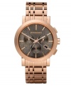 This Burberry timepiece features a rose-gold ion-plated check-inspired bracelet and round case. Gunmetal check-patterned chronograph dial features rose-gold tone stick indices, three subdials, date window at four o'clock, three hands and logo. Swiss quartz movement. Water resistant to 50 meters. Two-year limited warranty.
