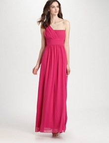 Equal parts elegant and playful, this eye-catching, asymmetrical style is a true show-stopper.Asymmetrical necklineRuched shoulder strapPleated bust and waistbandGathered skirtFully linedAbout 45 from natural waistPolyesterDry cleanImportedModel shown is 5'10 (177cm) wearing US size 4. Equal parts elegant and playful, this eye-catching, asymmetrical style is a true show-stopper.Asymmetrical necklineRuched shoulder strapPleated bust and waistbandGathered skirtFully linedAbout 45 from natural waistPolyesterDry cleanImportedModel shown is 5'10 (177cm) wearing US size 4.