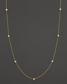 Diamond stations punctuate a long, elegant 18K yellow gold chain. By Roberto Coin. Diamond stations punctuate a long, elegant 18K yellow gold chain. By Roberto Coin.