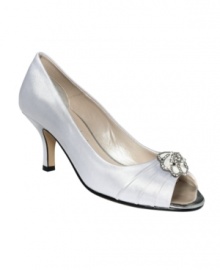Caparros' Amelia evening sandals are peep-toe with a pretty rhinestone flower. For dressy looks that don't demand a ton of height. Caparros' Amelia evening sandals are peep-toe with a pretty rhinestone flower. For dressy looks that don't demand a ton of height.