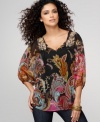 Dark beauty: a black background allows a vibrant paisley print to pop on One World's chiffon peasant top!