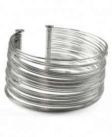 Slip on this slinky cuff bracelet from AK Anne Klein for a chic accent that's perfect with everything. Crafted in silvertone mixed metal. Approximate diameter: 2-1/4 inches. Slip on this slinky cuff bracelet from AK Anne Klein for a chic accent that's perfect with everything. Crafted in silvertone mixed metal. Approximate diameter: 2-1/4 inches.