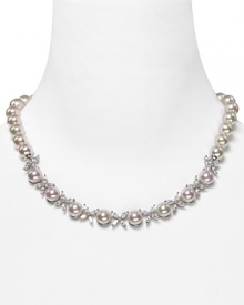 Dress up your signature LBD with Majorica's glowing pearl necklace with sparkling cubic zirconia accents. Dress up your signature LBD with Majorica's glowing pearl necklace with sparkling cubic zirconia accents.