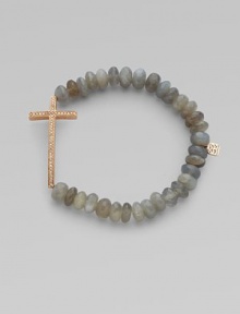 This grey moonstone beaded, stretch design is accented with a diamond embellished 14k rose gold cross on the horizontal for a modern look. Grey moonstone beads14K rose goldDiamonds, .26 tcwLength, about 6¾Elastic slip-on styleMade in USA of imported materials This grey moonstone beaded, stretch design is accented with a diamond embellished 14k rose gold cross on the horizontal for a modern look. Grey moonstone beads14K rose goldDiamonds, .26 tcwLength, about 6¾Elastic slip-on styleMade in USA of imported materials
