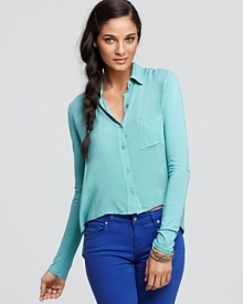 With a chic high/low hemline and classic collar, Splendid retools the button-front shirt into a fresh idea for fall. With a chic high/low hemline and classic collar, Splendid retools the button-front shirt into a fresh idea for fall.