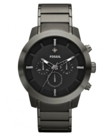 Daring in design, this gunmetal plated timepiece from Fossil rises above the pack with a single diamond accent. Daring in design, this gunmetal plated timepiece from Fossil rises above the pack with a single diamond accent.