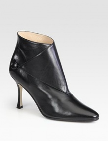 A cross-over panel secured by a chic button adds fashionable style to this slick leather design. Self-covered heel, 3½ (90mm)Leather upperButton closureLeather lining and solePadded insoleMade in ItalyOUR FIT MODEL RECOMMENDS ordering true size. A cross-over panel secured by a chic button adds fashionable style to this slick leather design. Self-covered heel, 3½ (90mm)Leather upperButton closureLeather lining and solePadded insoleMade in ItalyOUR FIT MODEL RECOMMENDS ordering true size.