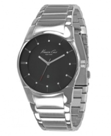 Streamline your style. This sleek KCNY watch features a smooth stainless steel bracelet and round case. Matte black dial with luminous stick indices, logo and date window. Analog movement. Water resistant to 30 meters. Limited lifetime warranty. Streamline your style. This sleek KCNY watch features a smooth stainless steel bracelet and round case. Matte black dial with luminous stick indices, logo and date window. Analog movement. Water resistant to 30 meters. Limited lifetime warranty.