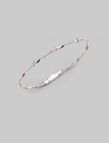 Simply stunning, this 18k gold bangle with delicate ridges and twists is studded with glimmering diamonds. Diamonds, 0.15 tcw 18k gold Diameter, about 2½ Push-lock clasp Made in Italy Please note: Bracelets sold separately. Simply stunning, this 18k gold bangle with delicate ridges and twists is studded with glimmering diamonds. Diamonds, 0.15 tcw 18k gold Diameter, about 2½ Push-lock clasp Made in Italy Please note: Bracelets sold separately.