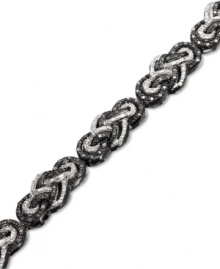 Add a new twist to your look in chic, contrasting colors. This braided bracelet will add extra dazzle to any outfit with round-cut white diamonds (2 ct. t.w.) and round-cut black diamonds (1-1/5 ct. t.w.). Set in sterling silver. Approximate length: 7-1/4 inches. Add a new twist to your look in chic, contrasting colors. This braided bracelet will add extra dazzle to any outfit with round-cut white diamonds (2 ct. t.w.) and round-cut black diamonds (1-1/5 ct. t.w.). Set in sterling silver. Approximate length: 7-1/4 inches.