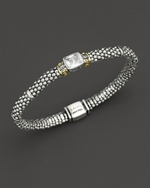 From the Glacier collection, thin caviar rope bracelet with centered white topaz stone and gold accents. Designed by Lagos. From the Glacier collection, thin caviar rope bracelet with centered white topaz stone and gold accents. Designed by Lagos.