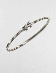 A charming, sterling silver cable design with a pretty diamond accented bow. Sterling silverDiamonds, .02 tcwDiameter, about 2½Slip-on styleImported A charming, sterling silver cable design with a pretty diamond accented bow. Sterling silverDiamonds, .02 tcwDiameter, about 2½Slip-on styleImported