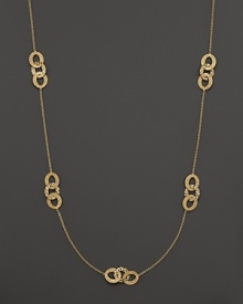 Hammered 18K yellow gold stations decorate a delicate chain on this timeless Roberto Coin necklace. Hammered 18K yellow gold stations decorate a delicate chain on this timeless Roberto Coin necklace.