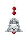 Set the tone for a beautiful holiday. The bell ornament from Baccarat illuminates the tree with faceted red beads and cut crystal on a strand of gold.