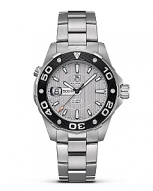 The Aquaracer concept is founded on providing the accuracy that all water sports demand. It is based on the design and features of the timeless TAG Heuer 2000 series launched in 1982. With silver dial and black coated bezel. Features a date window. The Aquaracer concept is founded on providing the accuracy that all water sports demand. It is based on the design and features of the timeless TAG Heuer 2000 series launched in 1982. With silver dial and black coated bezel. Features a date window.