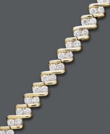 Exquisite shape and plenty of sparkle! Surprise her with this stunning tennis bracelet. A chic diagonal design with sparkling round-cut diamonds (1 ct. t.w.) will make quite the impact. Crafted in 10k gold. Approximate length: 7-1/2 inches. Exquisite shape and plenty of sparkle! Surprise her with this stunning tennis bracelet. A chic diagonal design with sparkling round-cut diamonds (1 ct. t.w.) will make quite the impact. Crafted in 10k gold. Approximate length: 7-1/2 inches.