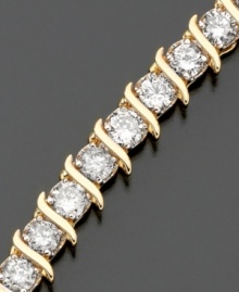 Sparkling round-cut diamonds (5 ct. t.w.) paired with polished 14k gold creates stunning style. Approximate bracelet length: 7 inches. Sparkling round-cut diamonds (5 ct. t.w.) paired with polished 14k gold creates stunning style. Approximate bracelet length: 7 inches.