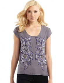 THE LOOKWoven crepe top with beaded and sequined floral designScoop necklineCap sleevesStraight front hem, curved back hemBack has low horizontal seam with gatheringTHE FITAbout 25 from shoulder to center of back hemTHE MATERIALPolyesterCARE & ORIGINHand washImported THE LOOKWoven crepe top with beaded and sequined floral designScoop necklineCap sleevesStraight front hem, curved back hemBack has low horizontal seam with gatheringTHE FITAbout 25 from shoulder to center of back hemTHE MATERIALPolyesterCARE & ORIGINHand washImported