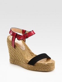 Braided hemp wedge with an adjustable leather ankle strap and contrasting canvas strap. Hemp wedge, 4 (100mm)Hemp platform, 1 (25mm)Compares to a 3 heel (75mm)Leather and canvas upperRubber soleImportedOUR FIT MODEL RECOMMENDS ordering true whole size; ½ sizes should order the next whole size down. Braided hemp wedge with an adjustable leather ankle strap and contrasting canvas strap. Hemp wedge, 4 (100mm)Hemp platform, 1 (25mm)Compares to a 3 heel (75mm)Leather and canvas upperRubber soleImportedOUR FIT MODEL RECOMMENDS ordering true whole size; ½ sizes should order the next whole size down.