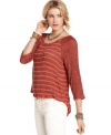 A high-low hem ups the edge on this slouchy Free People striped top -- a stylish spin on a staple!