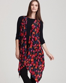 Undone, tied or wrapped, DKNY's floral-print cozy top layers seamlessly over basic tops and tees for statement-making style. Undone, tied or wrapped, DKNY's floral-print cozy top layers seamlessly over basic tops and tees for statement-making style.