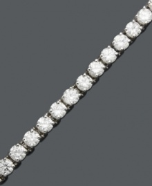 Diamond decadence. She will love you forever when she opens this gift. Tennis bracelet features a sparkling row of round-cut diamond (8 ct. t.w.) crafted in 14k white gold. Approximate length: 7 inches. Diamond decadence. She will love you forever when she opens this gift. Tennis bracelet features a sparkling row of round-cut diamond (8 ct. t.w.) crafted in 14k white gold. Approximate length: 7 inches.