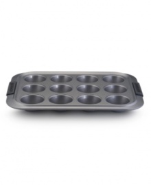 For crumb-free muffins that will make 'em go mmm, Anolon's muffin pan is a must-have! New proprietary coating ensures superior release and makes cleanup a snap. Silicon-enhanced handles are steady and slip-free, while the pan's substantial weight provides durability and helps prevent warping. For crumb-free muffins that will make 'em go mmm, Anolon's muffin pan is a must-have! New proprietary coating ensures superior release and makes cleanup a snap. Silicon-enhanced handles are steady and slip-free, while the pan's substantial weight provides durability and helps prevent warping.