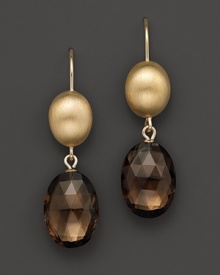 Faceted smoky quartz ovals, set in 14K yellow gold. Faceted smoky quartz ovals, set in 14K yellow gold.