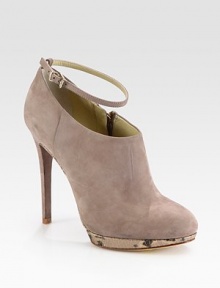 Velvety soft suede is paired with a metallic snake-print platform and topped with an adjustable ankle strap. Self-covered heel, 4½ (115mm)Metallic snake-print leather platform, ½ (15mm)Compares to a 4 heel (100mm)Suede upperAdjustable ankle strap and side zipLeather lining and solePadded insoleImported Velvety soft suede is paired with a metallic snake-print platform and topped with an adjustable ankle strap. Self-covered heel, 4½ (115mm)Metallic snake-print leather platform, ½ (15mm)Compares to a 4 heel (100mm)Suede upperAdjustable ankle strap and side zipLeather lining and solePadded insoleImported