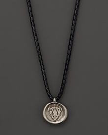 Silver Gucci charm on a braided black natural leather necklace. Silver Gucci charm on a braided black natural leather necklace.