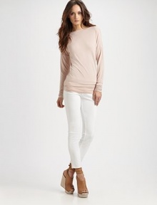 Super-soft boatneck has dropped shoulders and a silhouette that hits below the hips. BoatneckDropped shouldersLong sleevesLonger length hits below the hips95% micro modal/5% spandexDry cleanImportedModel shown is 5'11 (180cm) wearing US size Small. Super-soft boatneck has dropped shoulders and a silhouette that hits below the hips. BoatneckDropped shouldersLong sleevesLonger length hits below the hips95% micro modal/5% spandexDry cleanImportedModel shown is 5'11 (180cm) wearing US size Small.