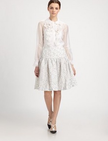 Airy silk organza, featuring tiered cuffs, delicate pleating, and floral appliqués.Shirt collarButton front placket flanked by pleatingFloral appliquésLong blouson sleeves with tiered cuffsIncluded silk camisoleAbout 21 from shoulder to hemSilkMade in Italy of imported fabricDry cleanModel shown is 5'11 (180cm) wearing US size 4. Airy silk organza, featuring tiered cuffs, delicate pleating, and floral appliqués.Shirt collarButton front placket flanked by pleatingFloral appliquésLong blouson sleeves with tiered cuffsIncluded silk camisoleAbout 21 from shoulder to hemSilkMade in Italy of imported fabricDry cleanModel shown is 5'11 (180cm) wearing US size 4.