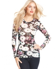 Go for winter florals with this BCBGMAXAZRIA top, perfect for adding a pop of print to your cold-weather look! Go for winter florals with this BCBGMAXAZRIA top, perfect for adding a pop of print to your cold-weather look!