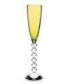 Color it chic. Baccarat takes already-stunning Vega stemware to the next level with this olive-tinted flute. A chunky, beaded stem contrasts brilliant color in heavy, exquisitely crafted crystal.