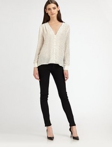 Featherweight silk blouse topped with shoulder pleats and glimmering studs. V-neckShoulder pleatsLong sleeves with buttoned cuffsLonger length hits below the hipsSilkDry cleanImportedModel shown is 5'10 (177cm) wearing US size Small. Featherweight silk blouse topped with shoulder pleats and glimmering studs. V-neckShoulder pleatsLong sleeves with buttoned cuffsLonger length hits below the hipsSilkDry cleanImportedModel shown is 5'10 (177cm) wearing US size Small.