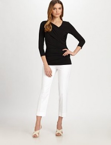 A unique design featuring a feminine neckline and asymmetrical details for a flattering effect. V-necklineLong sleevesAsymmetrical gathered detailsPull-on styleAbout 26 from shoulder to hem91% viscose/9% spandexHand washImported Model shown is 5'10 (177cm) wearing US size Small. A unique design featuring a feminine neckline and asymmetrical details for a flattering effect. V-necklineLong sleevesAsymmetrical gathered detailsPull-on styleAbout 26 from shoulder to hem91% viscose/9% spandexHand washImported Model shown is 5'10 (177cm) wearing US size Small.