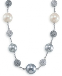 Like a twinkling strand of tinsel, this Carolee necklace will be the perfect trimming. Necklace features white glass pearls, charcoal glass pearls, and sparkling fireballs. Set in silvertone mixed metal. Approximate length: 16 inches + 2-inch extender. Like a twinkling strand of tinsel, this Carolee necklace will be the perfect trimming. Necklace features white glass pearls, charcoal glass pearls, and sparkling fireballs. Set in silvertone mixed metal. Approximate length: 16 inches + 2-inch extender.