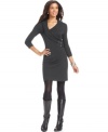 AGB's sweater dress looks extra chic with an asymmetrical neckline and faux leather buckled details at the waist.