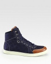 High-top sneaker in nylon guccissima with leather trim.Rubber soleMade in Italy