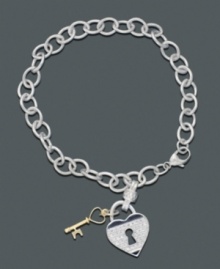 Lock your heart...but don't throw away the key. Keep them side by side on this darling sterling silver bracelet featuring a diamond heart charm (1/5 ct. t.w.) and 14k gold key. Approximate length: 7 inches. Approximate charm drop: 7/8 inch. Lock your heart...but don't throw away the key. Keep them side by side on this darling sterling silver bracelet featuring a diamond heart charm (1/5 ct. t.w.) and 14k gold key. Approximate length: 7 inches. Approximate charm drop: 7/8 inch.